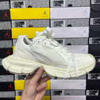 Balenciaga white knit sneakers with lace-up front, textured upper and chunky sole