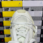 Balenciaga unisex sneakers close-up of tongue and laces, white textured upper