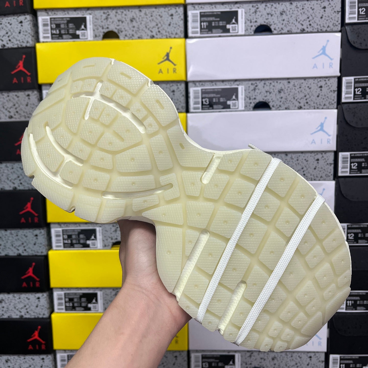 Balenciaga unisex sneakers outsole view with tread pattern and white sole