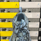 Light blue sneaker heel and laces with mesh upper and padded collar