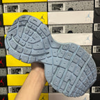 Light blue rubber outsole with traction tread pattern