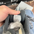 Size label inside gray sneaker: BALENCIAGA with EUR/UK/US/JP sizes