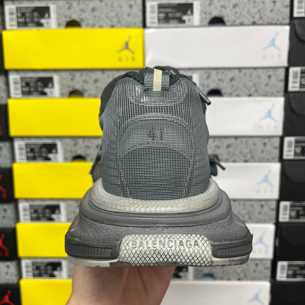 Gray rear view of lace-up sneaker with padded collar and thick sole