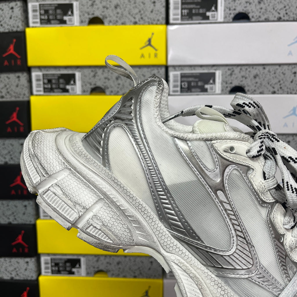 Balenciaga unisex silver sneakers, quarter view with side logo panel