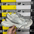 Balenciaga unisex silver sneakers with textured side panel and lace-up front