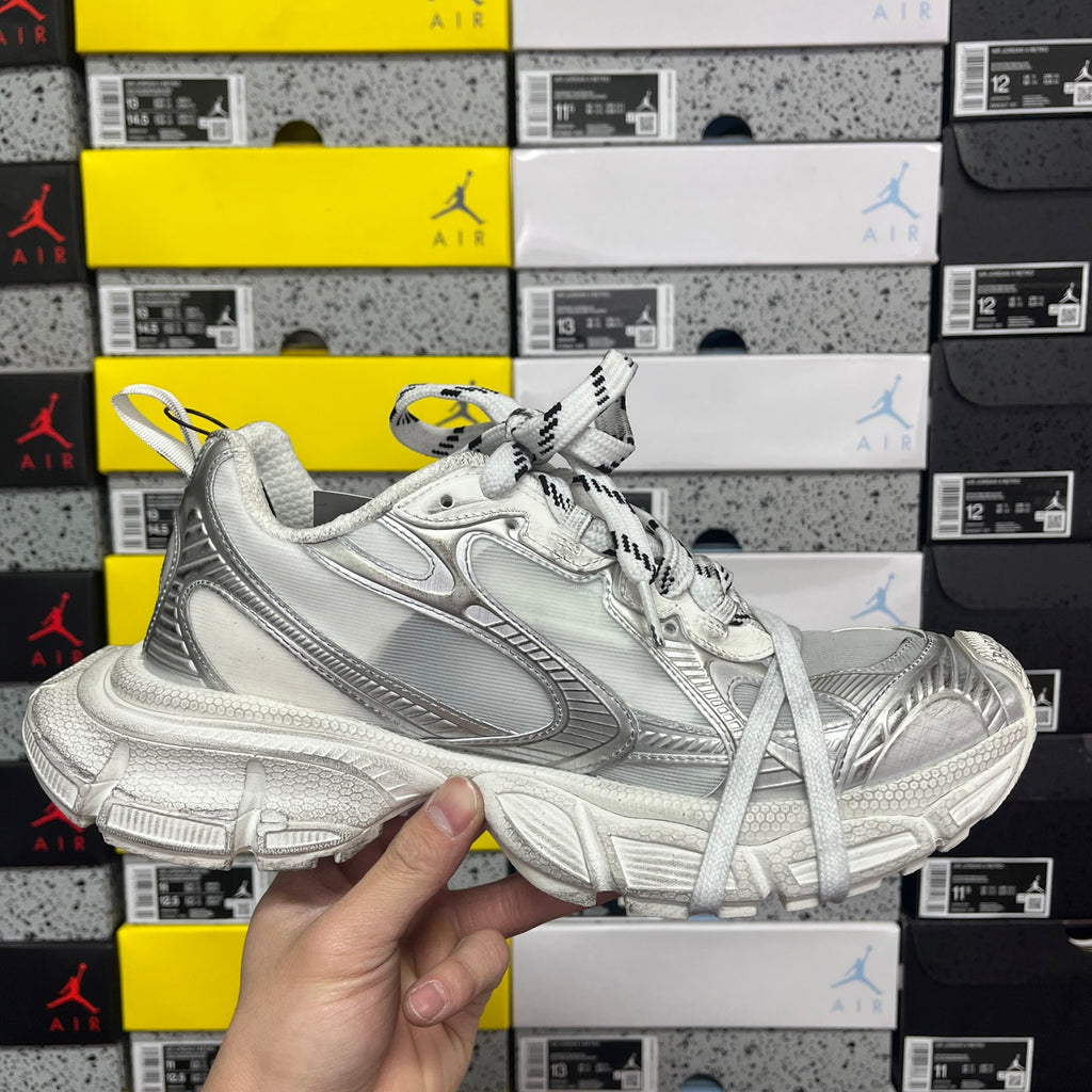 Balenciaga unisex silver lace-up sneakers, side-by-side angle