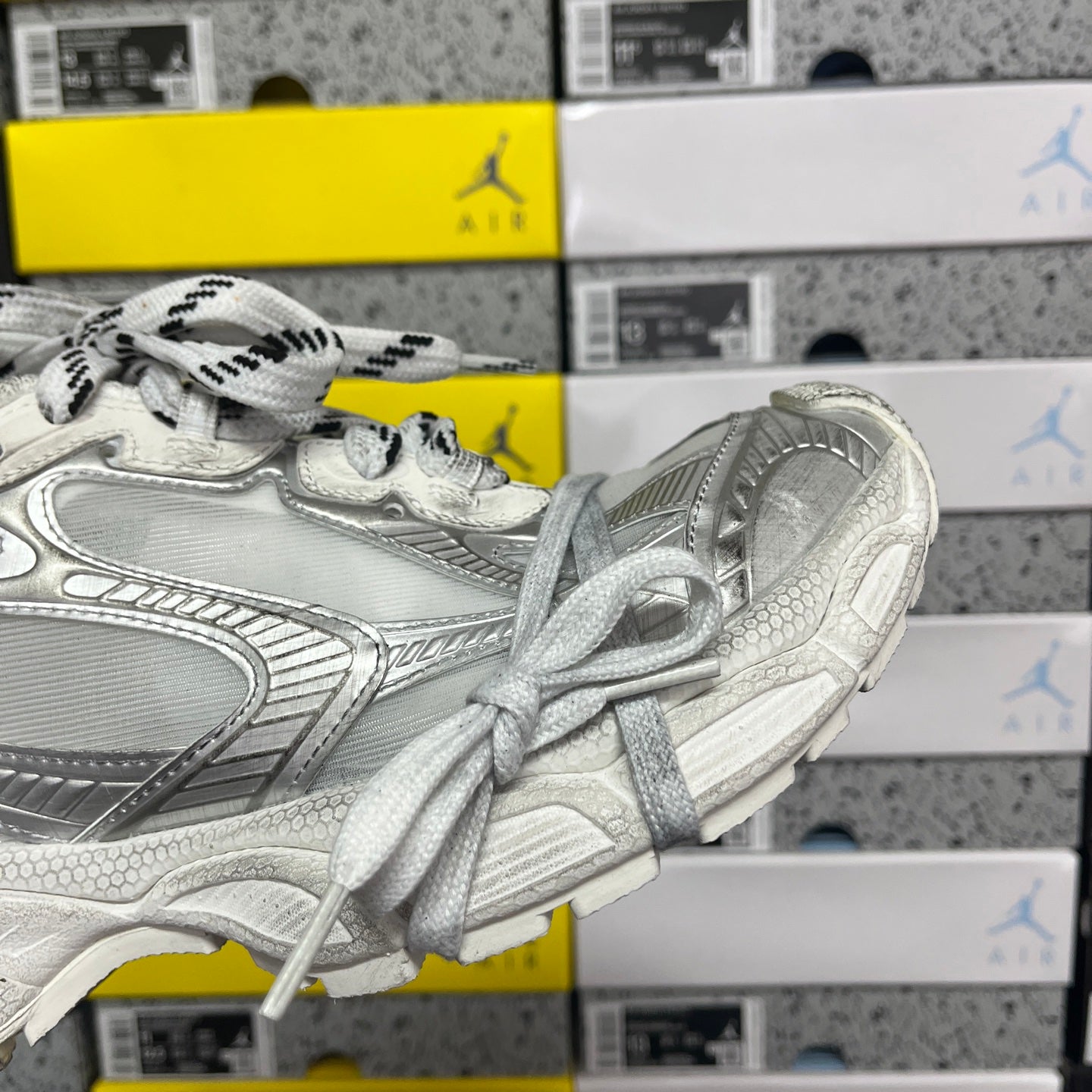 Balenciaga unisex silver sneakers, toe and side detail with lace-up bow