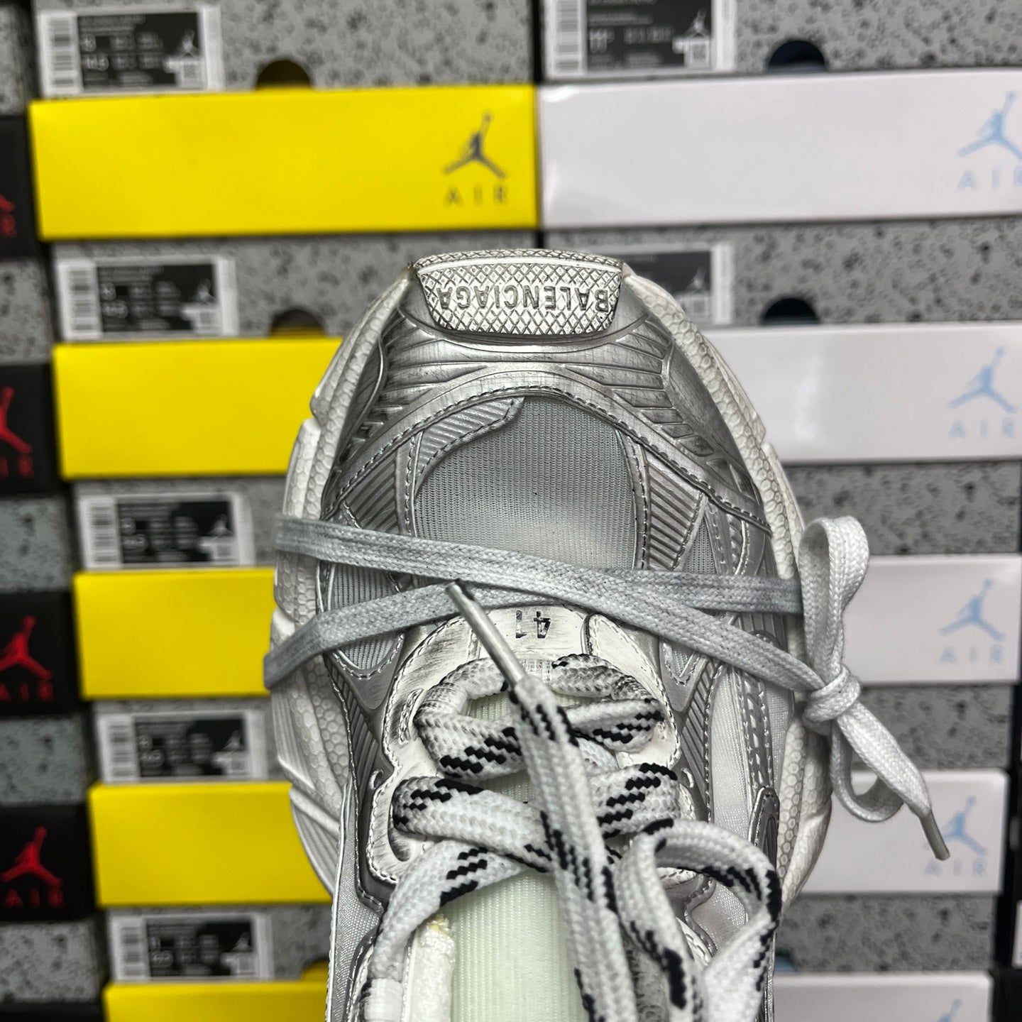 Balenciaga unisex silver sneaker upper and laces, top-down close-up