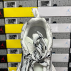 Balenciaga unisex silver sneaker tongue and lace close-up