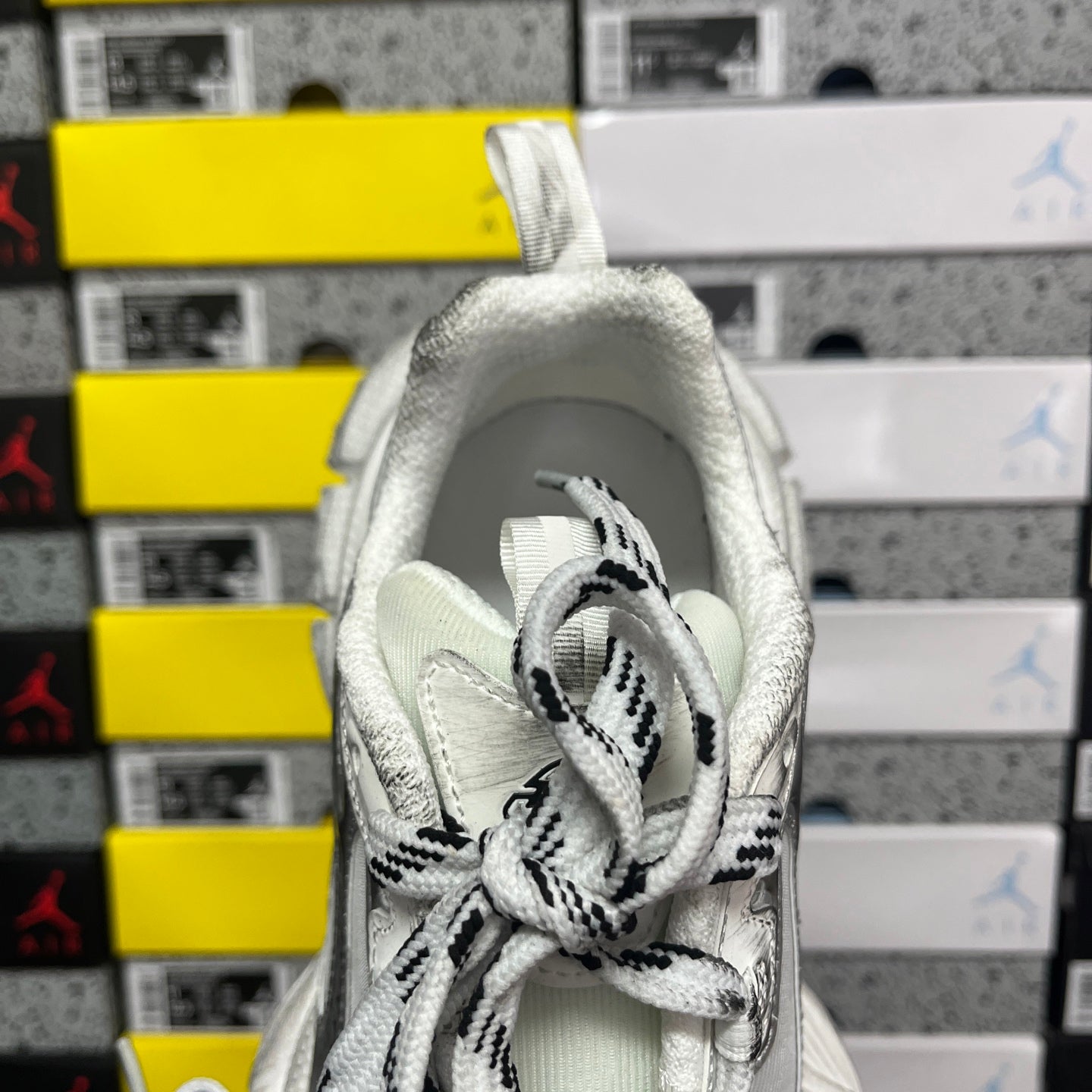 Balenciaga unisex silver sneaker tongue and lace close-up