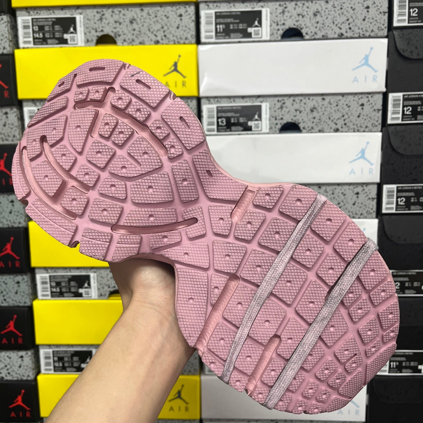 Balenciaga unisex sneaker outsole in pink with molded grid traction pattern.