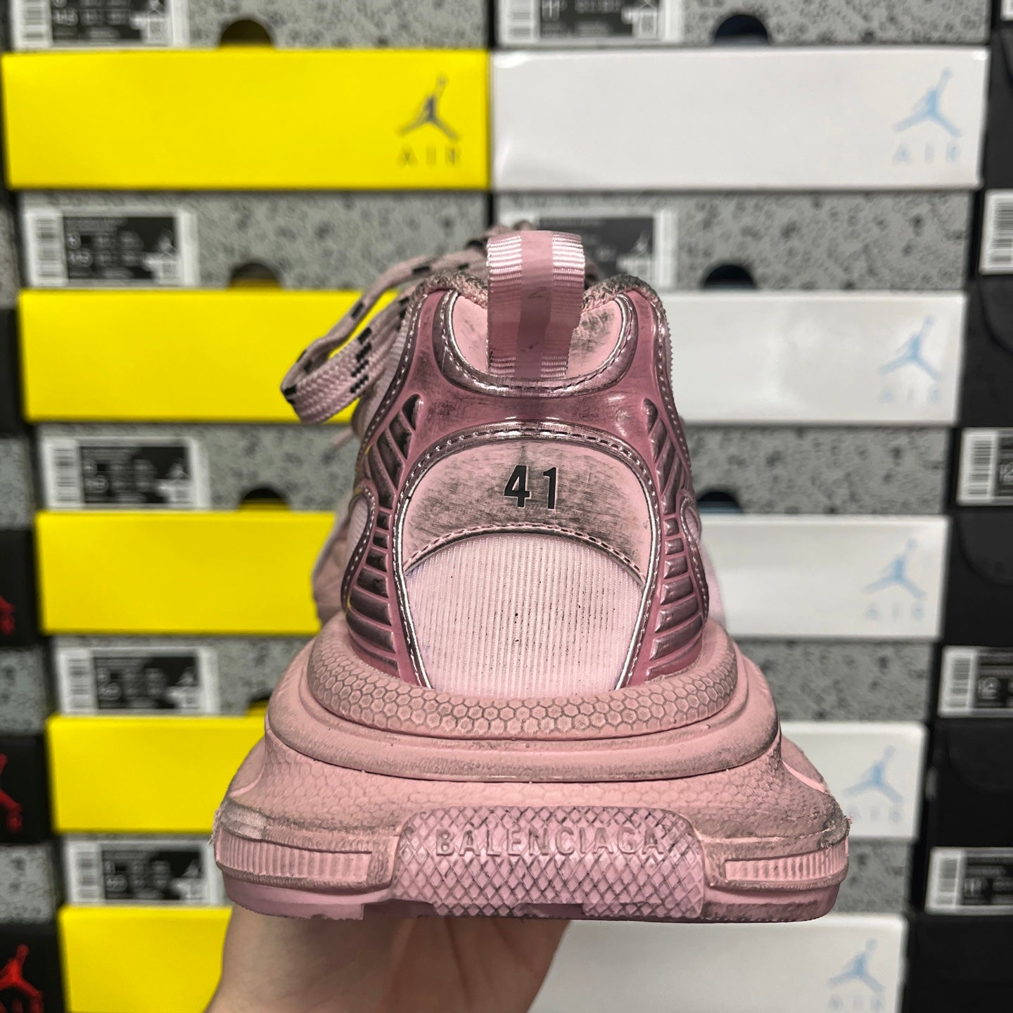 Balenciaga unisex sneaker heel view in pink with embossed '41' on the back.