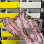 Balenciaga unisex sneaker heel-side view in pink with lace-up and textured overlay.