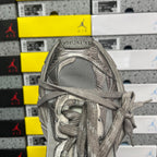 Balenciaga unisex gray sneaker toe and lace-up opening with tongue overlay.