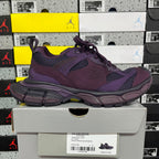 Balenciaga unisex purple lace-up sneakers with cushioned midsole and mesh upper