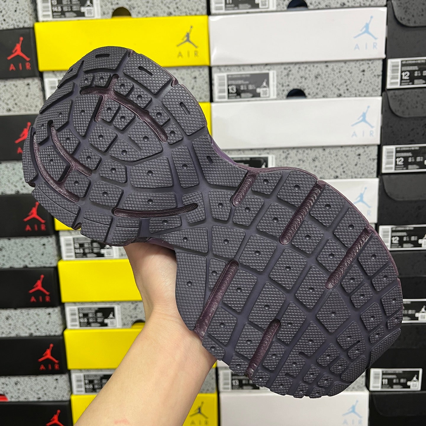 Balenciaga unisex purple sneaker outsole with deep traction tread pattern