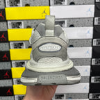 Balenciaga sneaker heel with BALENCIAGA logo patch and textured light gray outsole