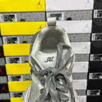 Balenciaga sneaker heel view with gray laces and padded back collar in light gray