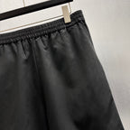 Black shorts close-up of elastic waistband and side seam
