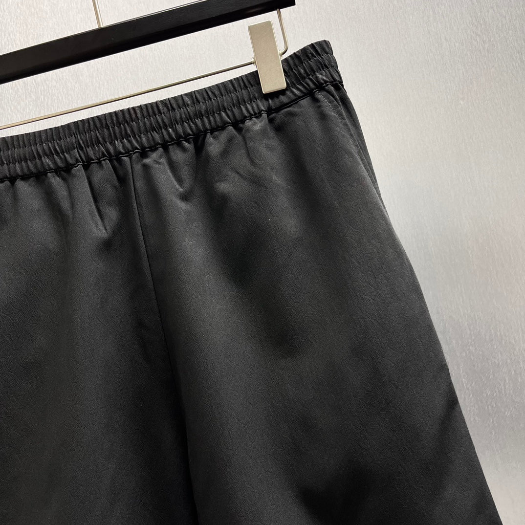 Black shorts close-up of elastic waistband and side seam