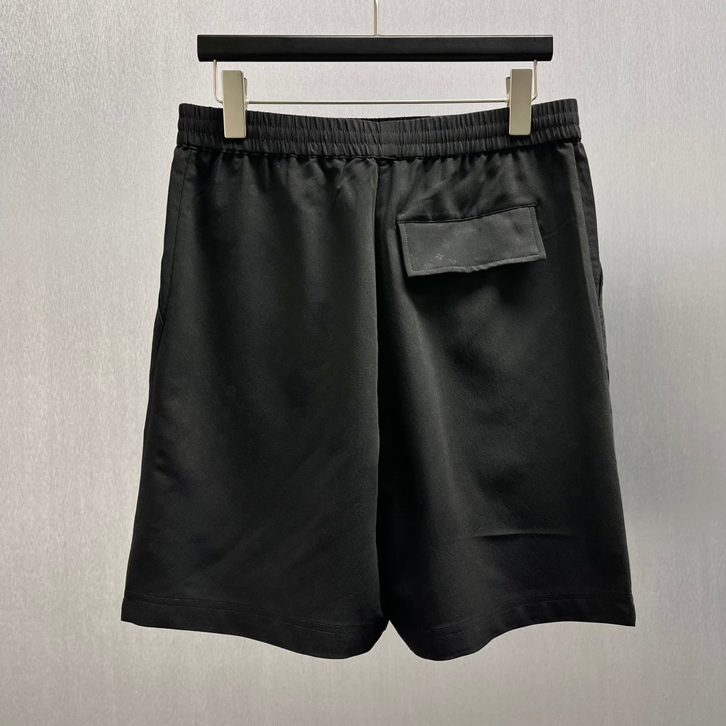 Black shorts with front pockets and elastic waistband