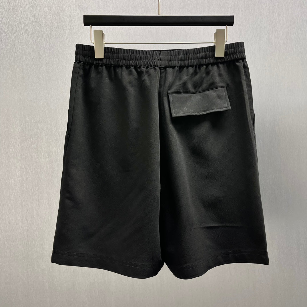 Black shorts with front pockets and elastic waistband