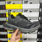 Grey mesh and suede sport sneaker with black laces and chunky rubber sole