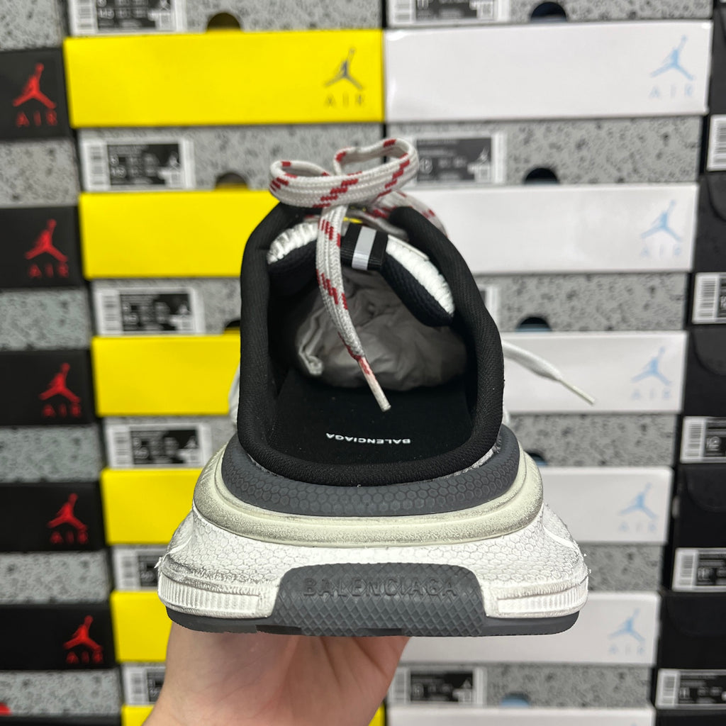 Balenciaga unisex sneaker heel with black strap and thick gray outsole, white-red laces