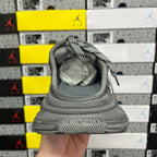 Gray sneaker heel with “BALENCIAGA” branding and padded collar