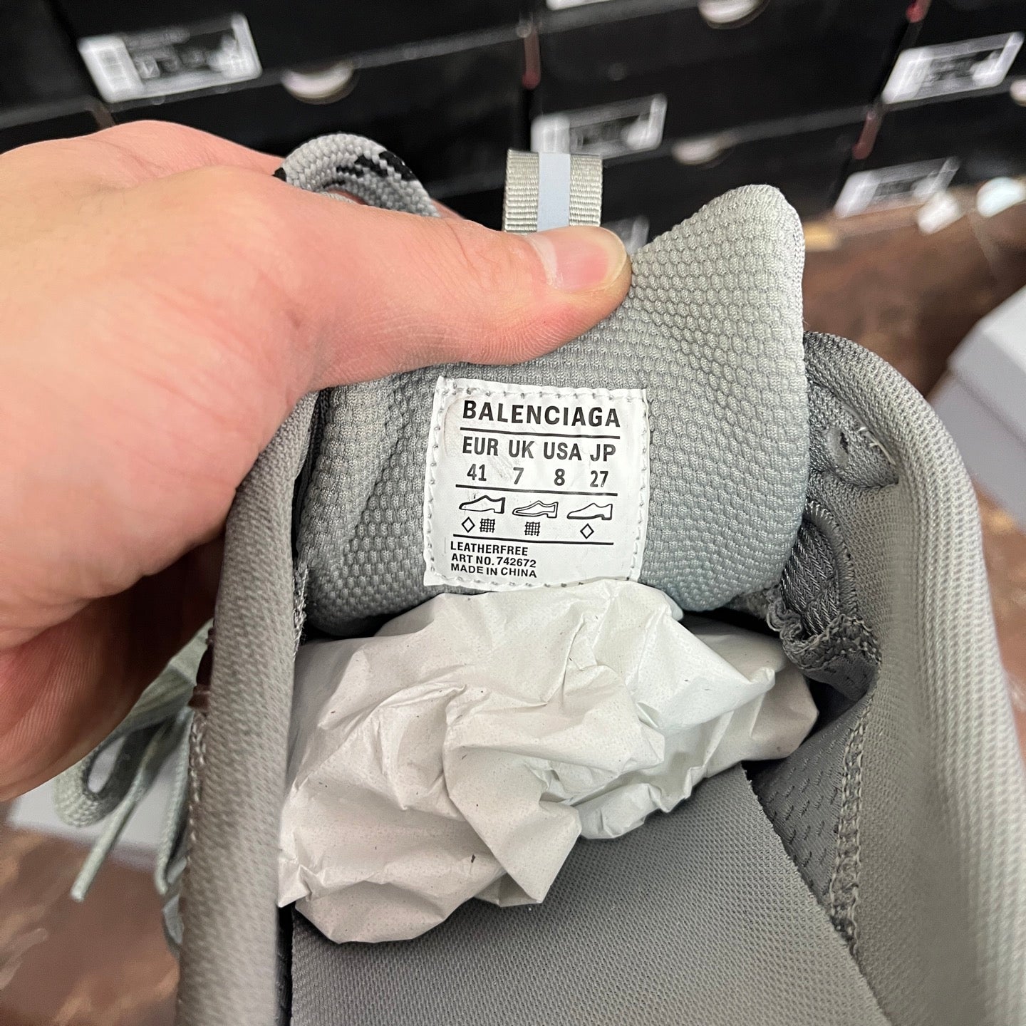 Gray sneaker interior label showing Balenciaga and size 41