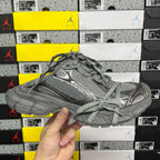 Gray mesh and leather-style unisex sneakers with lace-up front and sculpted sole