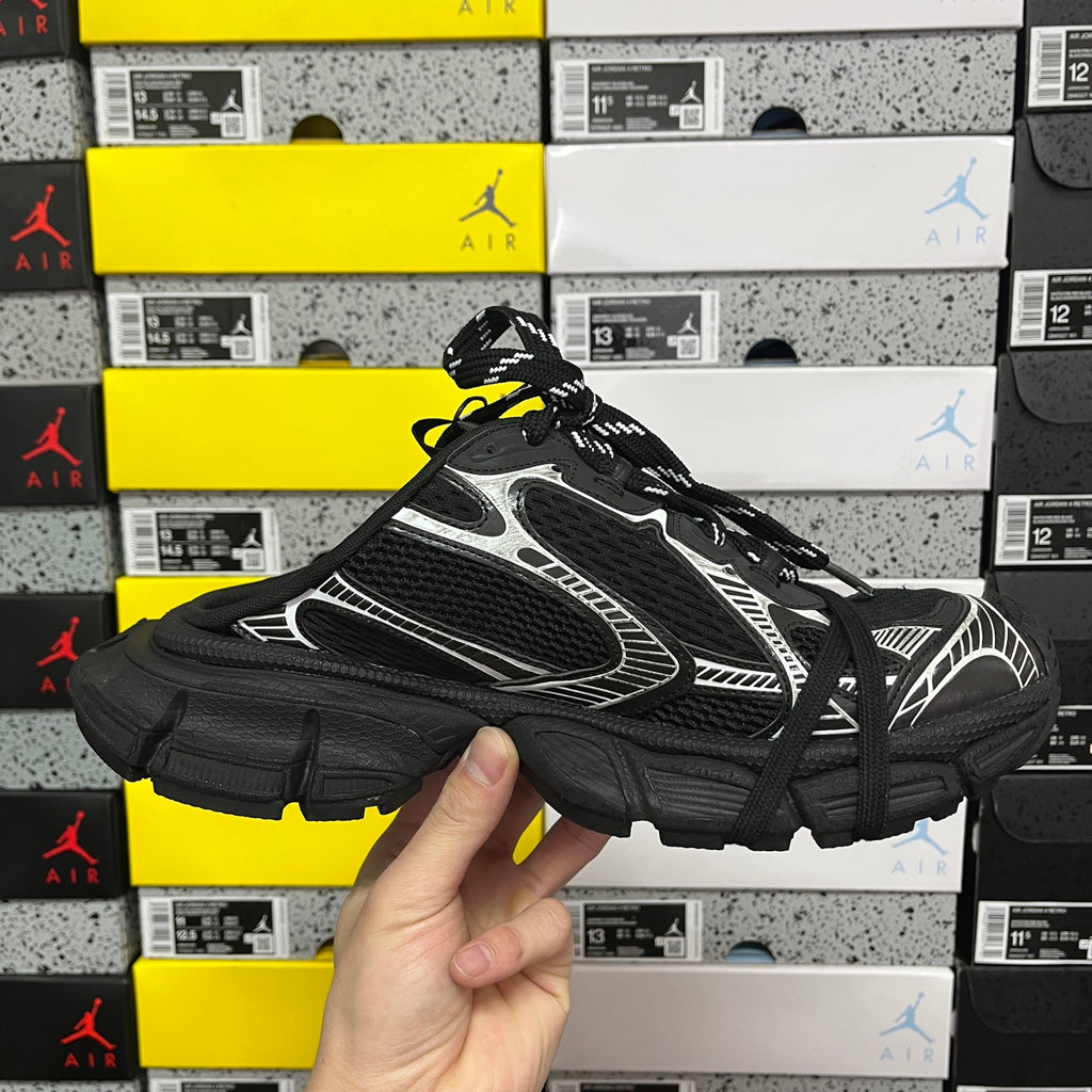 Balenciaga unisex sneakers, three-quarter front view with black and white paneling