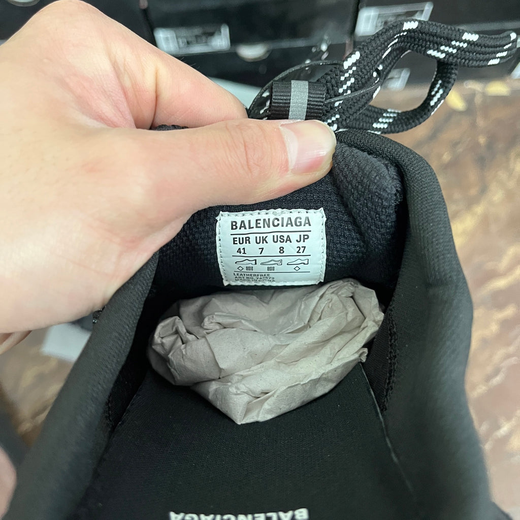 Balenciaga unisex sneaker interior label on black tongue, size chart visible