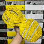 Balenciaga unisex sneakers outsole view: bright yellow tread with gray side stripes