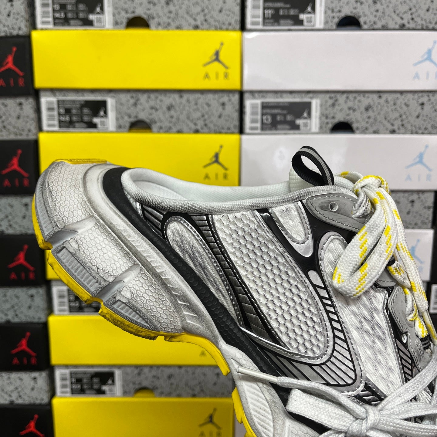 Balenciaga unisex sneakers upper close-up in silver-gray with black stripe and white laces