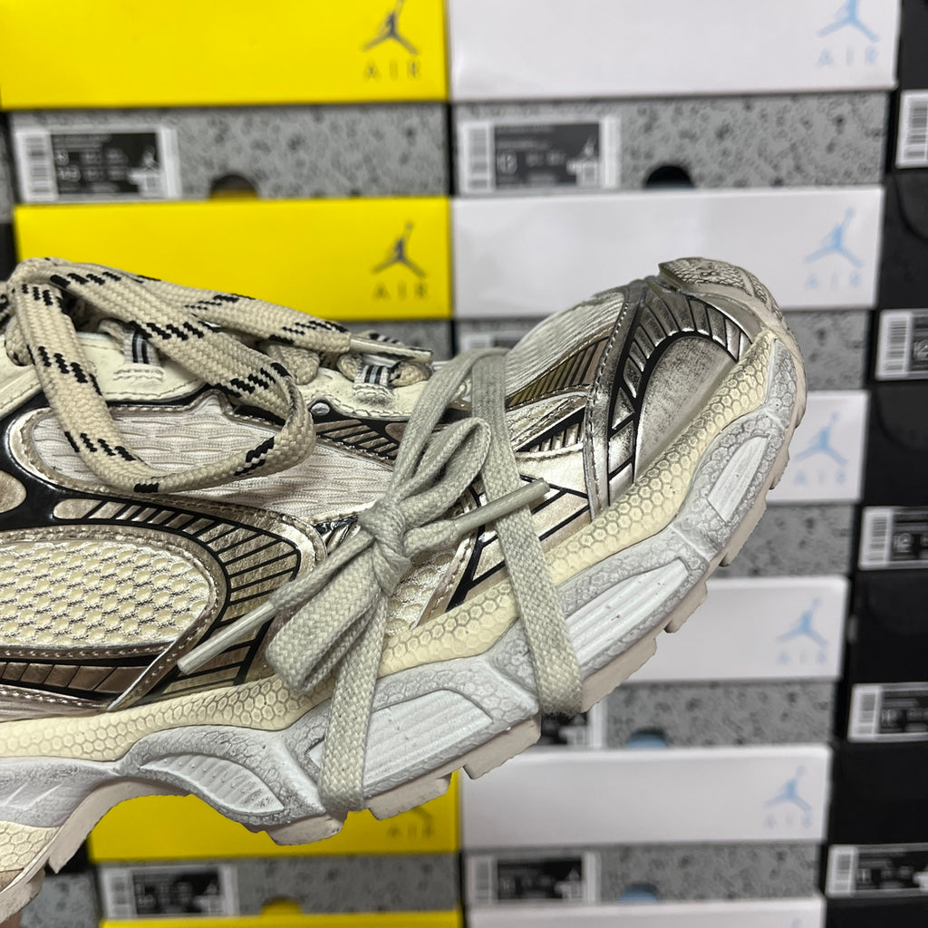 Off-white Balenciaga unisex sneakers side view with sculpted sole and laces