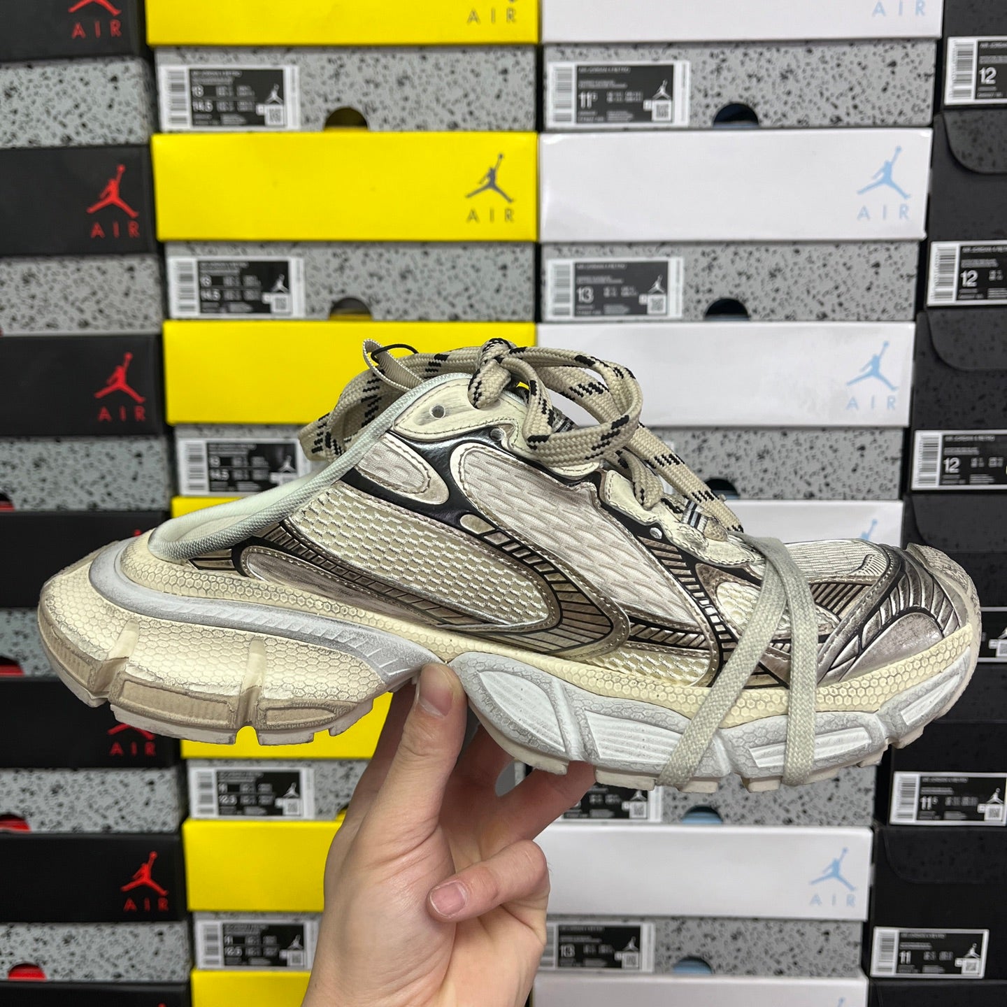 Off-white Balenciaga unisex sneakers front side view with lace-up and mesh panels