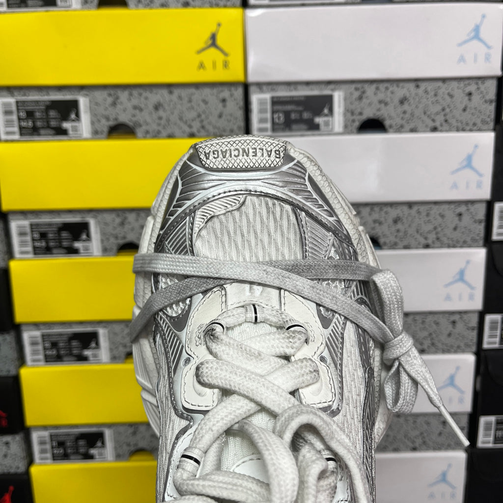 White Balenciaga sneaker toe and laces with textured upper