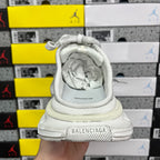 White Balenciaga sneaker rear view with heel collar and embossed logo