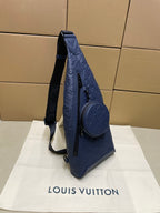 Blue monogram shoulder bag with side zipper and front round crossbody pouch