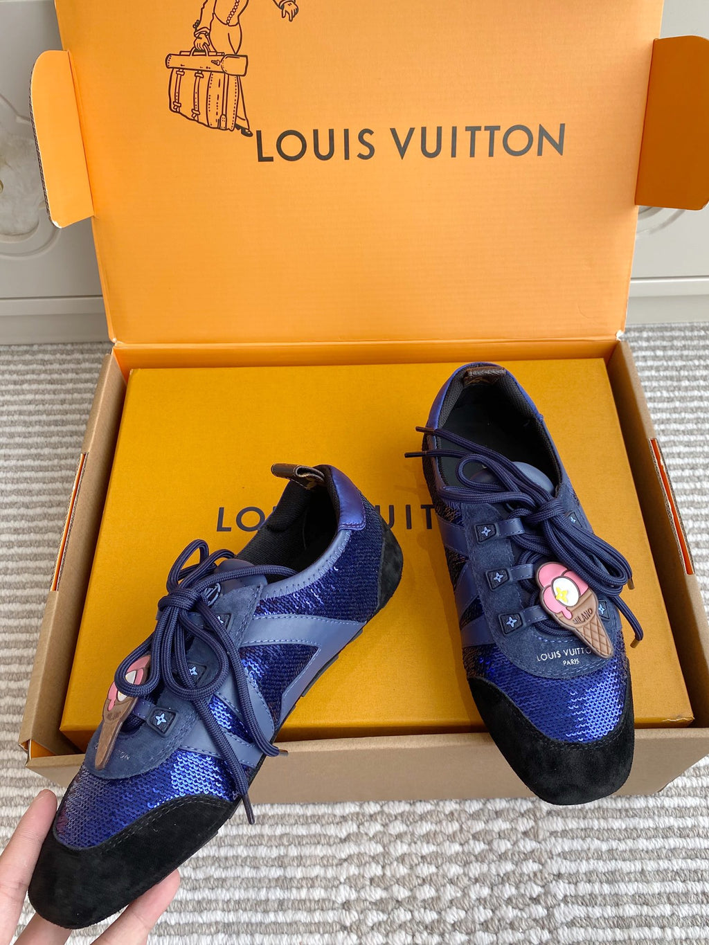Louis Vuitton unisex sneakers, blue textured panels with black toe caps and laces