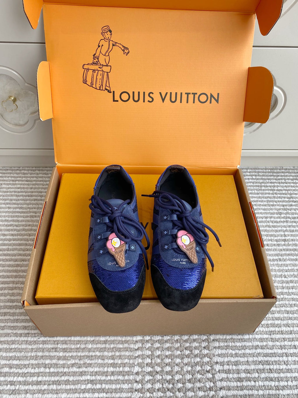 Louis Vuitton unisex sneakers, blue fabric with black toe and lace-up design
