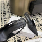 Women's black pointed toe slingback shoe with bow, side view
