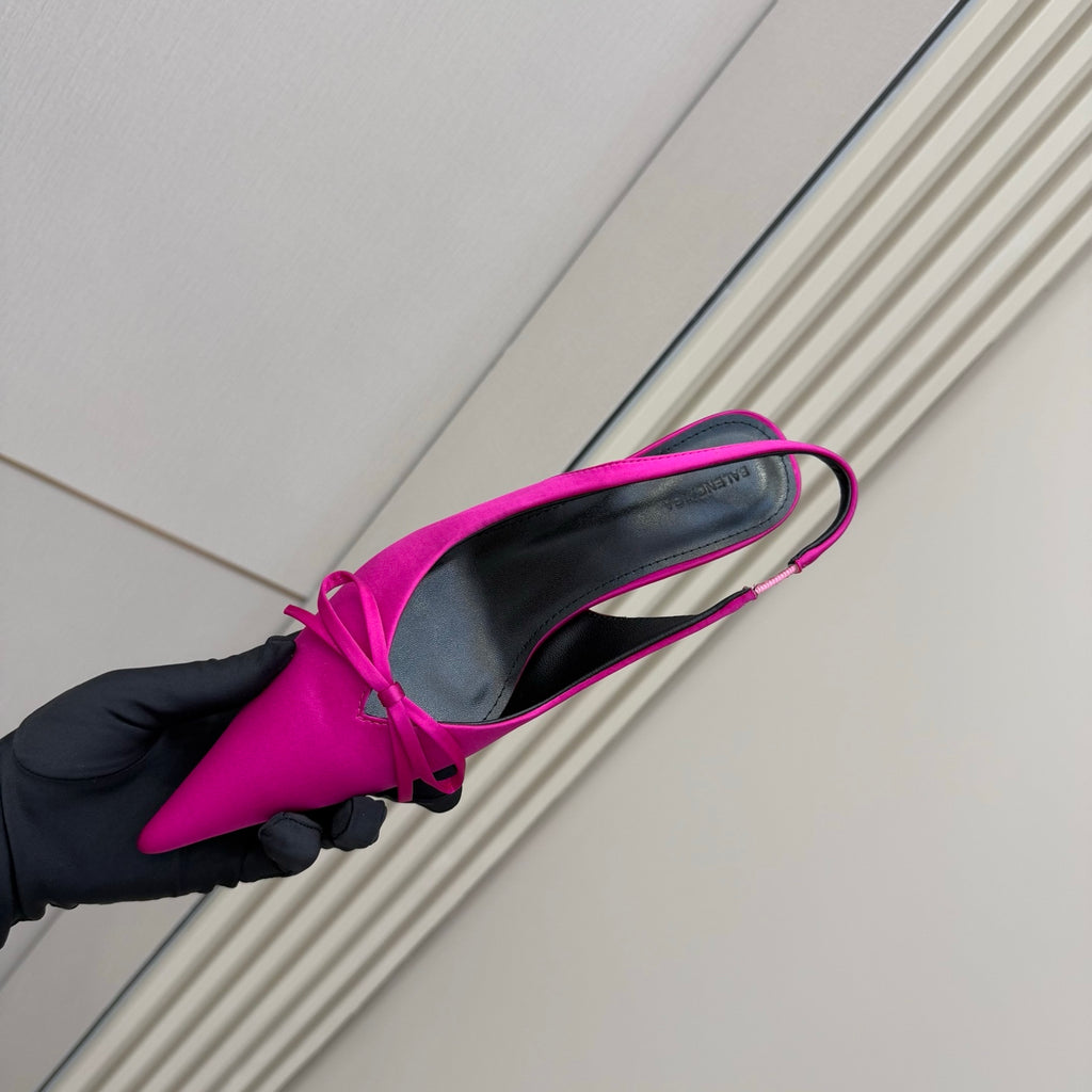 Women's hot pink slingback pump with pointed toe and bow strap