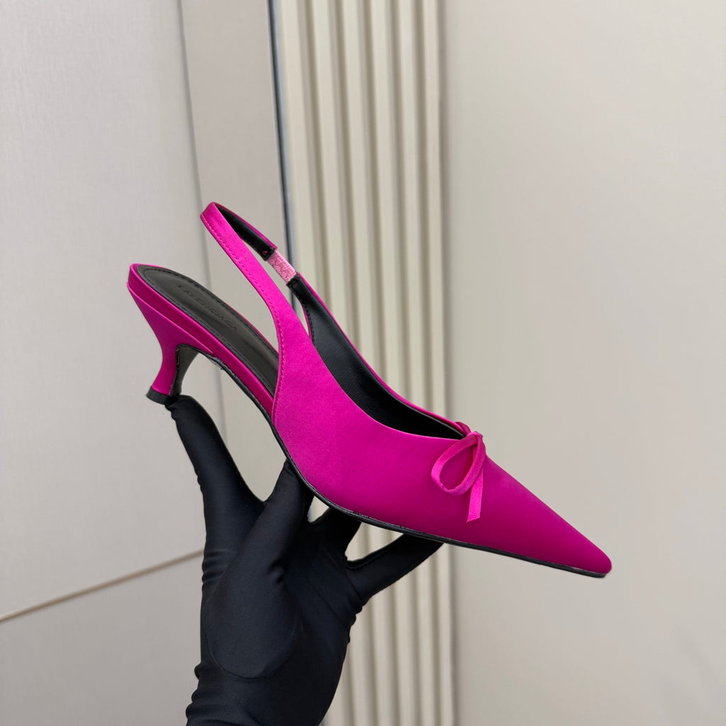 Women's hot pink slingback pump with pointed toe, bow strap, stiletto heel
