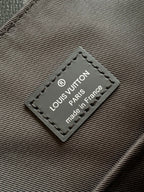 Louis Vuitton bag label: Louis Vuitton Paris, made in France on stitched gray patch