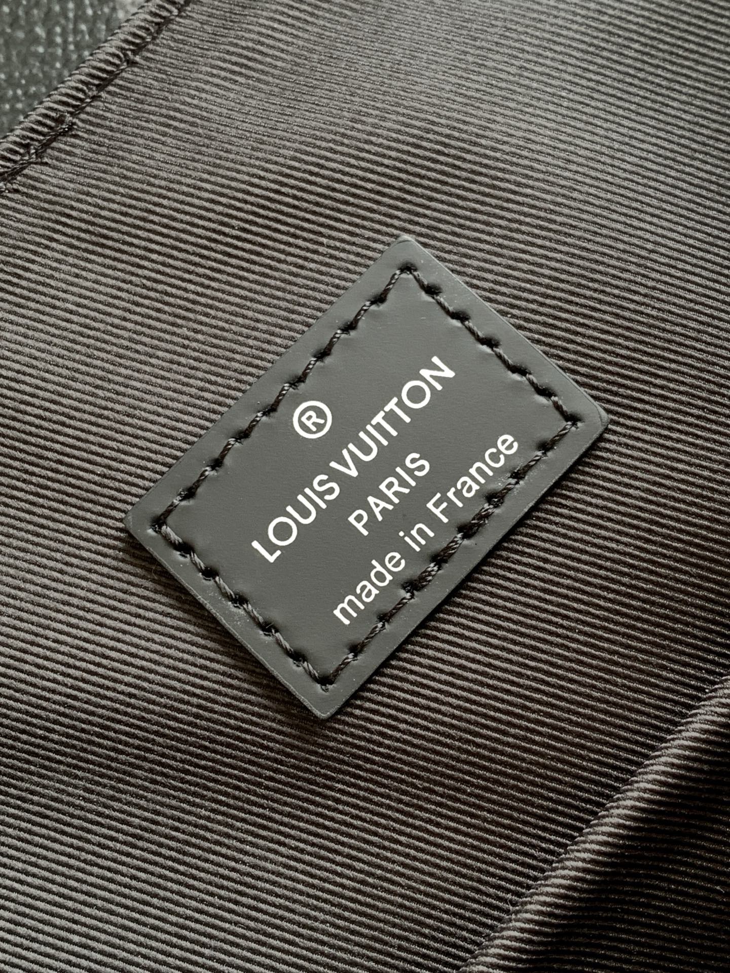 Louis Vuitton bag label: Louis Vuitton Paris, made in France on stitched gray patch