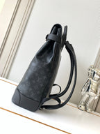 Louis Vuitton men's monogram backpack side view with adjustable shoulder strap