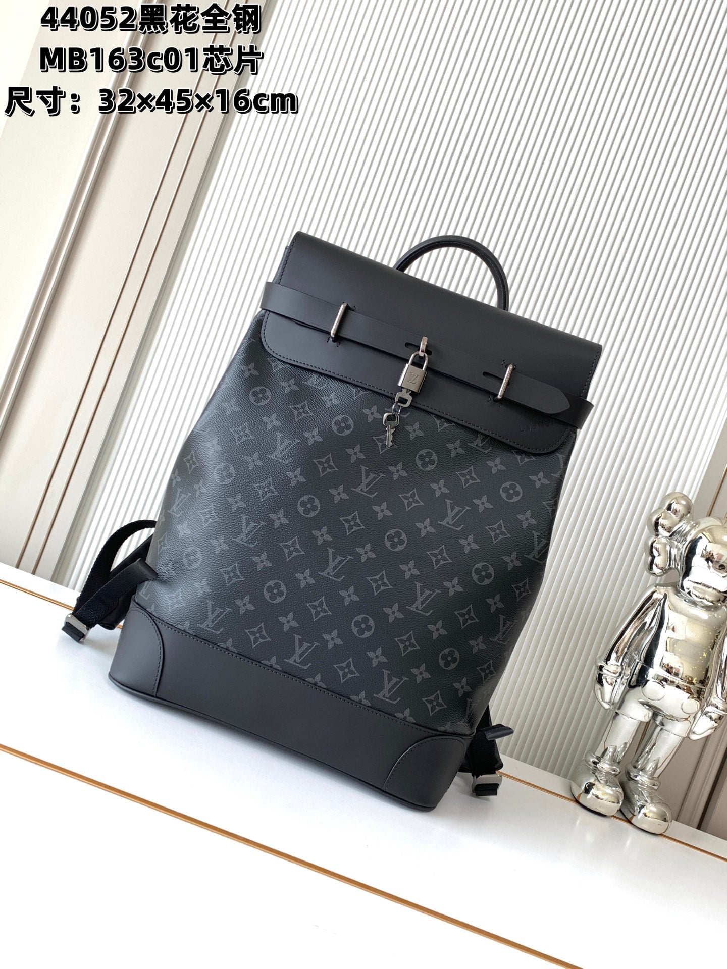 Louis Vuitton men's monogram backpack with top handle, front flap, and leather straps