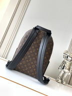 Louis Vuitton monogram backpack back view with adjustable straps and black side panels